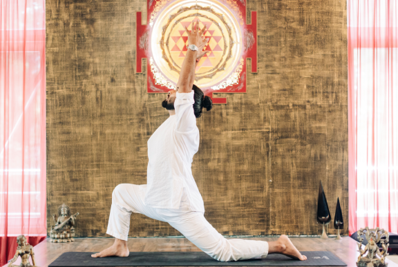 Yoga teacher trainees learning mantras and yogic philosophy in India