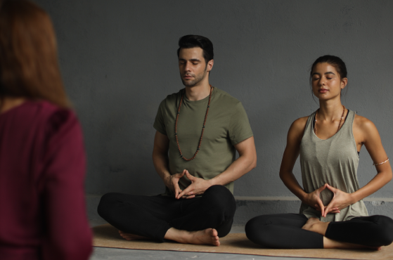Foreign Student Practicing Yoga In Rishikesh